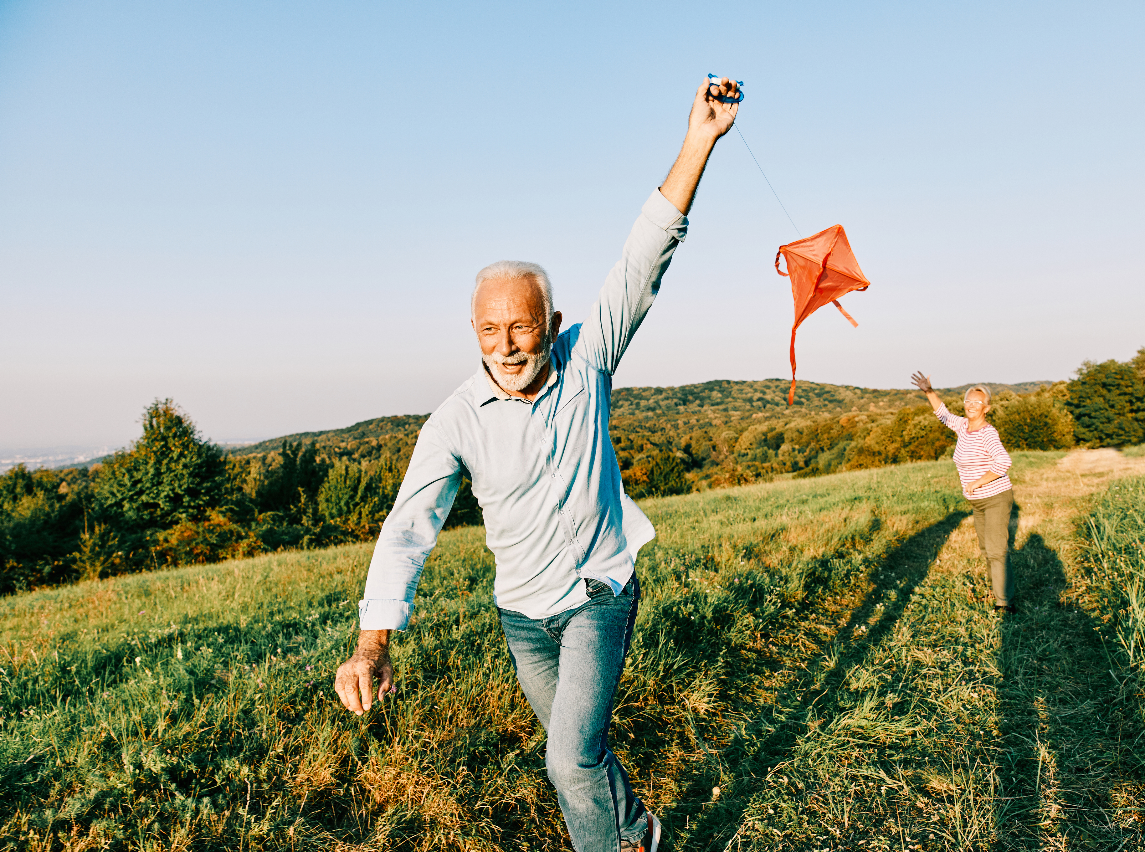 Active older couple enjoying movement outdoors